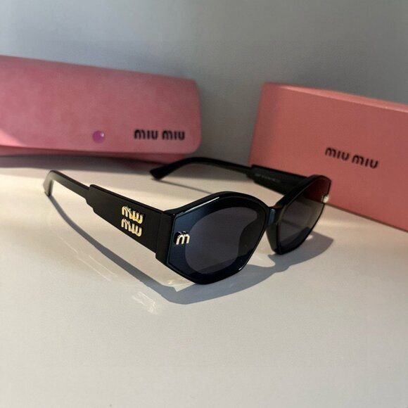 Miu Miu Black Sunglasses with Gold Detail - Picture 1 of 7
